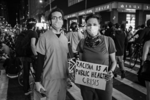 A Photographer Documents Manhattan Protest in Their Essay: Sign O’ The Times [PHOTOS]